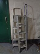 A triple aluminium extending ladder,