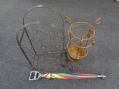 A wrought metal wine rack together with a further metal rope stick stand containing a shooting