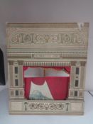 A mid twentieth century folding pine and cardboard puppet theatre