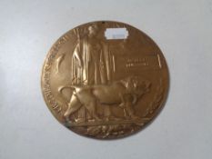 A WWI bronze death plaque named to Robert Turnbull