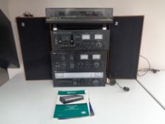 A four piece twentieth century HMV hifi stack system to include a 4000P belt drive turn table,