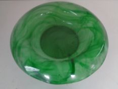 A large mid twentieth century green glass bowl