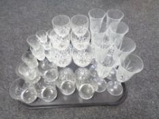 A tray containing assorted led crystal drinking glasses