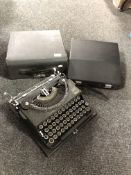 A cased vintage Imperial typewriter together with a further Silver Reed typewriter