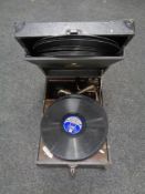 An HMV tabletop gramophone together with a small quantity of 78s