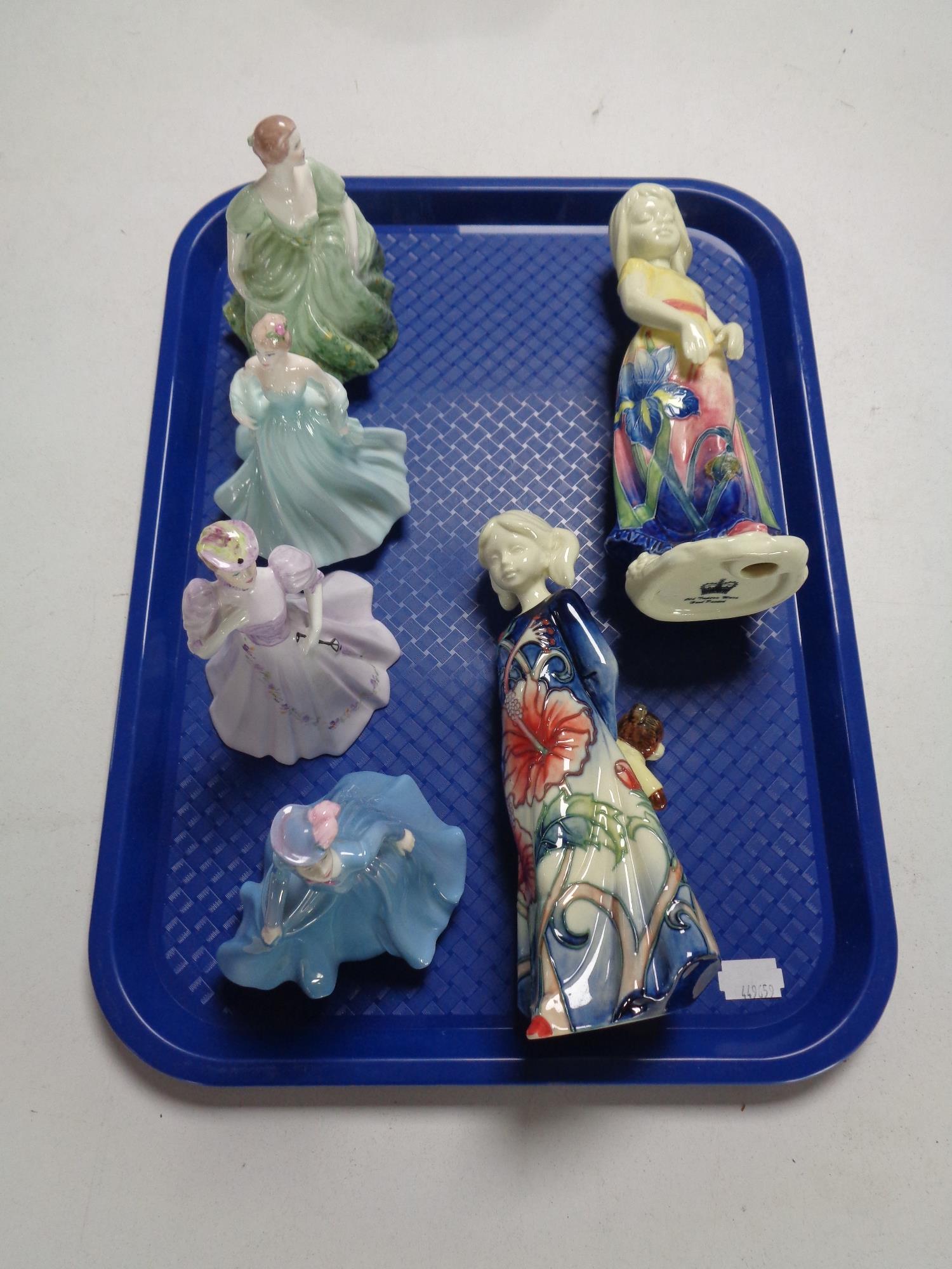 A tray containing two Old Tupton ware hand painted figures of girls together with four further