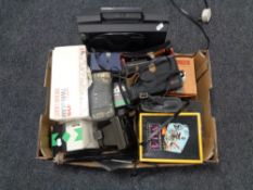 A box containing cameras and photographic equipment,