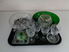 A tray containing assorted glassware to include cut glass fruit bowl on raised feet, rose ball,