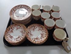 A tray containing thirty pieces of antique floral patterned tea china