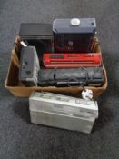 A box containing six transistor radios to include Grundig, Hitachi,