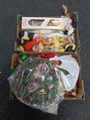 Two boxes containing clown dolls and Christmas decorations