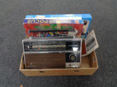 A box containing a Grundig yacht boy 210 radio with instructions,