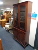 A late nineteenth century double door bookcase,