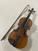 A 20th century Antonius Stradivarius copy violin and bow CONDITION REPORT: Back 14".