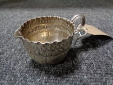 A Victorian silver small jug, 59.