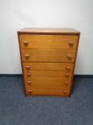 A mid twentieth century teak six drawer chest