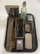 A tray containing 007 tin with die cast guns, cigarette case, bandolier of bullets,