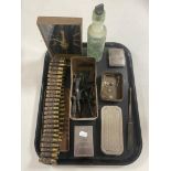 A tray containing 007 tin with die cast guns, cigarette case, bandolier of bullets,
