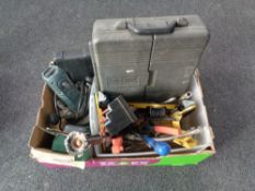 A box containing Black and Decker router bits, hand tools, case tool set,
