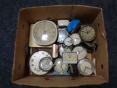 A box of mid century and later alarm and wall clocks