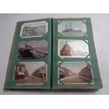 An album of approximately two hundred early 20th century and later postcards relating to the North