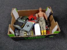 A box containing vintage toys to include die cast vehicles, action men, plastic aircraft etc.