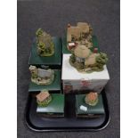 A tray containing six boxed Lilliput Lane ornaments to include Grasmere Church, The Toy Menders,