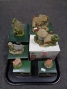 A tray containing six boxed Lilliput Lane ornaments to include Grasmere Church, The Toy Menders,