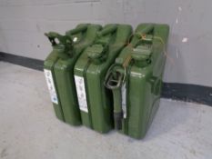 Three ten litre jerrycans, one with nozzle.