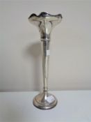 A Birmingham silver fluted vase on weighted base, height 20 cm.