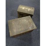 Two brass embossed coal boxes.