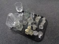 A tray containing antique and later glassware to include salts, cruets,