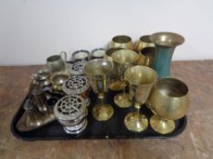 A tray containing assorted metalware to include plated cruets, miniature wine coolers,