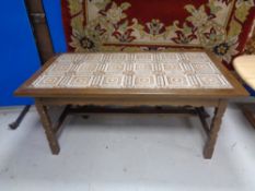 A 20th century continental tiled top coffee table