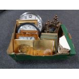 A box containing contemporary framed prints and mirrors, sorted wall clocks,
