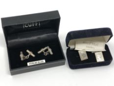 A pair of silver Royal Mail cufflinks together with a further pair of sterling silver cufflinks.