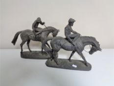 Two composite figures of jockeys on horses.