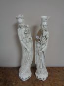 A pair of Eastern chalk figures.