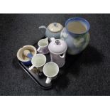 A tray containing Denby teapot, a glazed Poole pottery vase, a pestle and mortar,