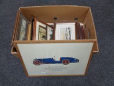 A box containing assorted framed pictures to include I.