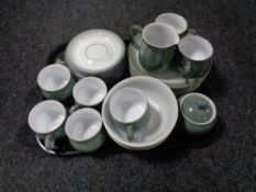 A tray containing 26 pieces of Denby tea and dinner ware.