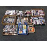Nine boxes and crates containing assorted DVDs and CDs.