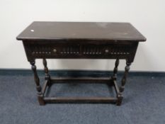 A two drawer Jacobean style hall table.