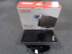 A Toshiba 22 inch LCD TV, DVD combi in original box.