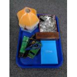 A tray containing tin plate rolling stock, vintage glass light shade, assorted watch straps,