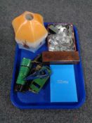 A tray containing tin plate rolling stock, vintage glass light shade, assorted watch straps,