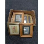 A box containing six assorted framed pictures, flowers.