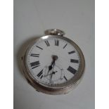 A silver cased pocket watch.