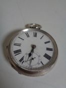 A silver cased pocket watch.