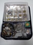 A tray containing a large quantity of assorted foreign coinage, pre decimal coins, half crowns etc.